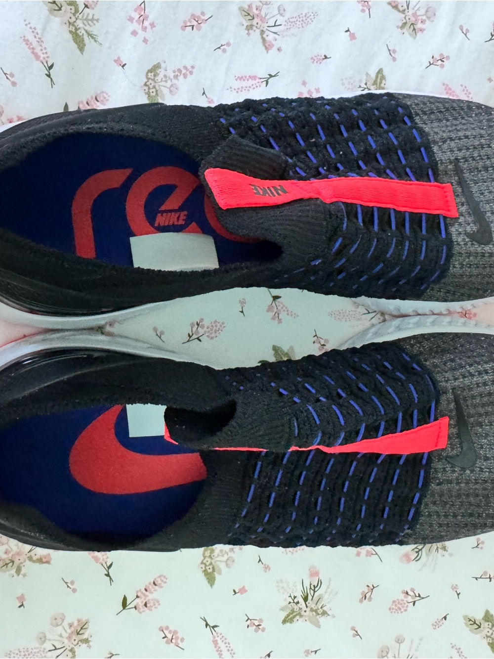 Nike Black Slip-On Runners with Blue Stitching and Neon Pink Tab